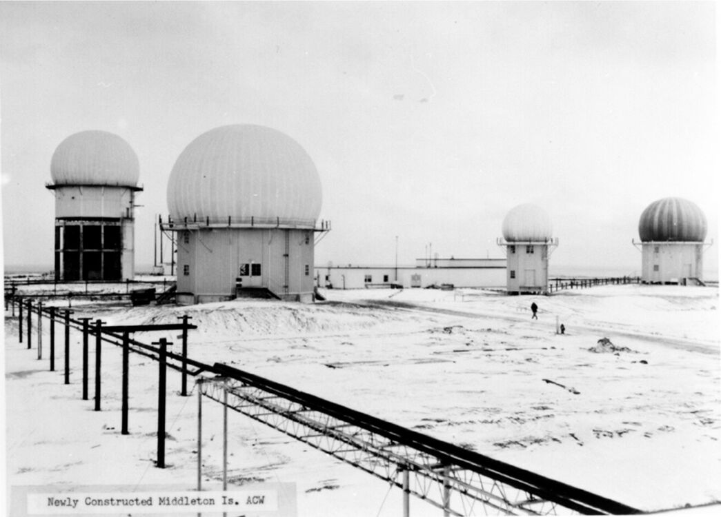 Middleton Island Air Force Station Operations Area 1960s. L-to-R FPS-3 Tower, FPS-6 Tower, Operations Building, FPS-4 Tower and FPS-8 Tower.