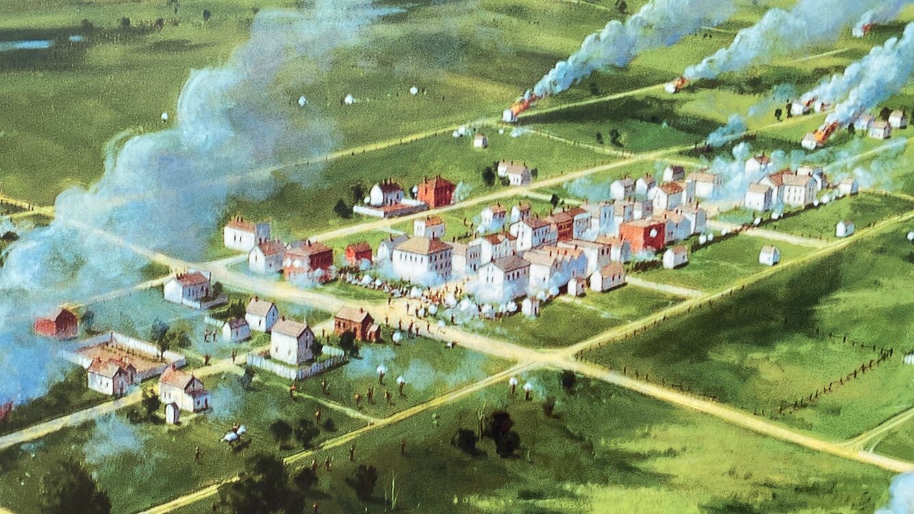 New Ulm Fortifications During the 2nd Battle, Part of a Painting by Michael Eischen reproduced on a readerboard outside the New Ulm Historical Society.